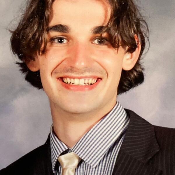 Headshot image of GREGORY – Flynn David