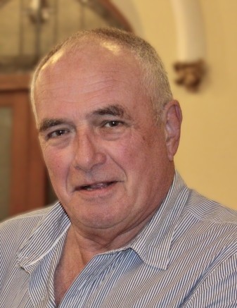 Headshot image of ROBERTS – Paul Bryan